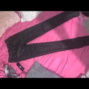Black SU coated skinny jeans